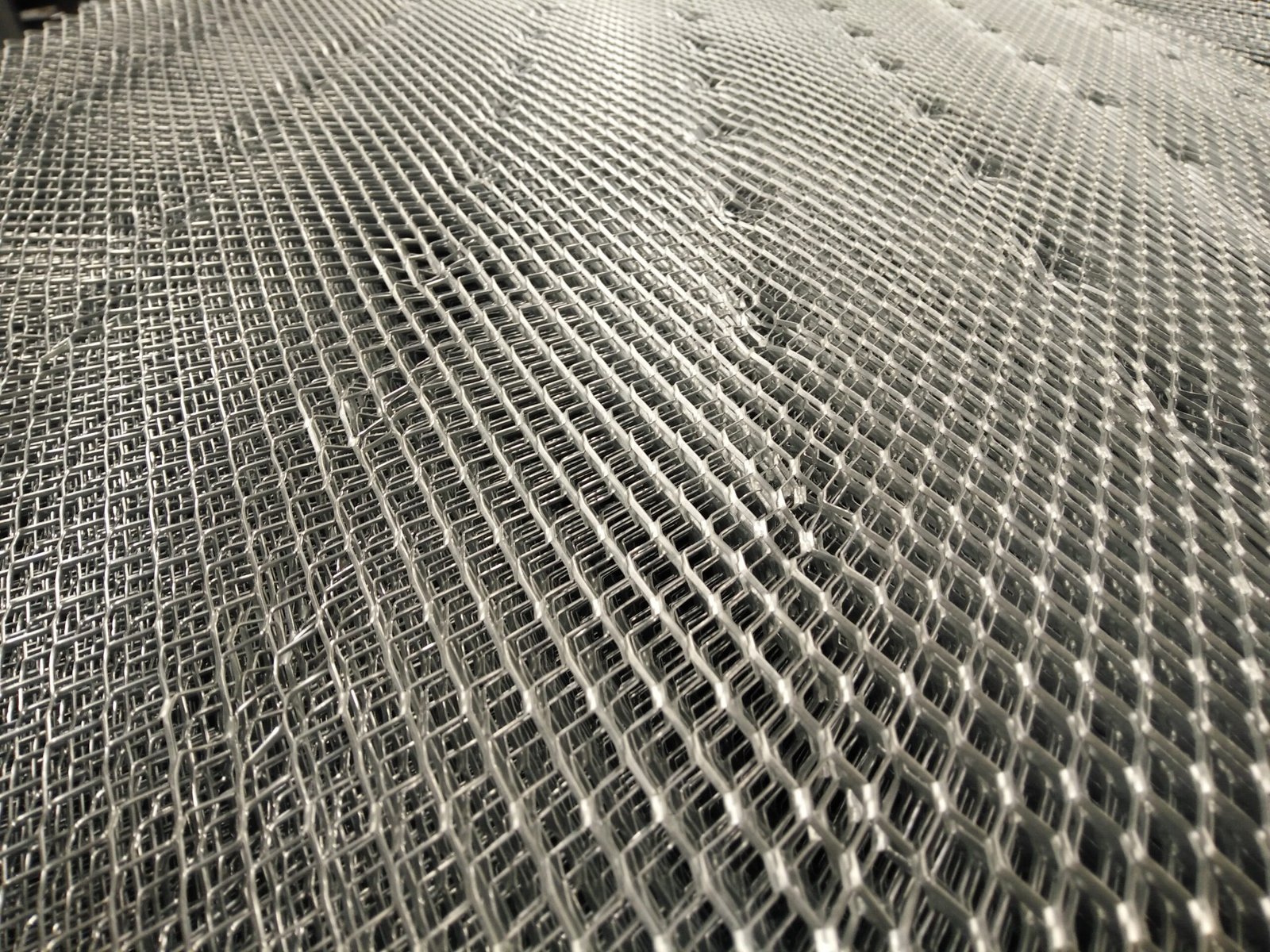 Self-Furring Dimple Lath application for stucco and plaster
